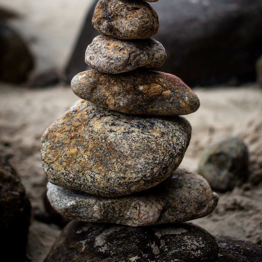 River stones stacked on each other in balance