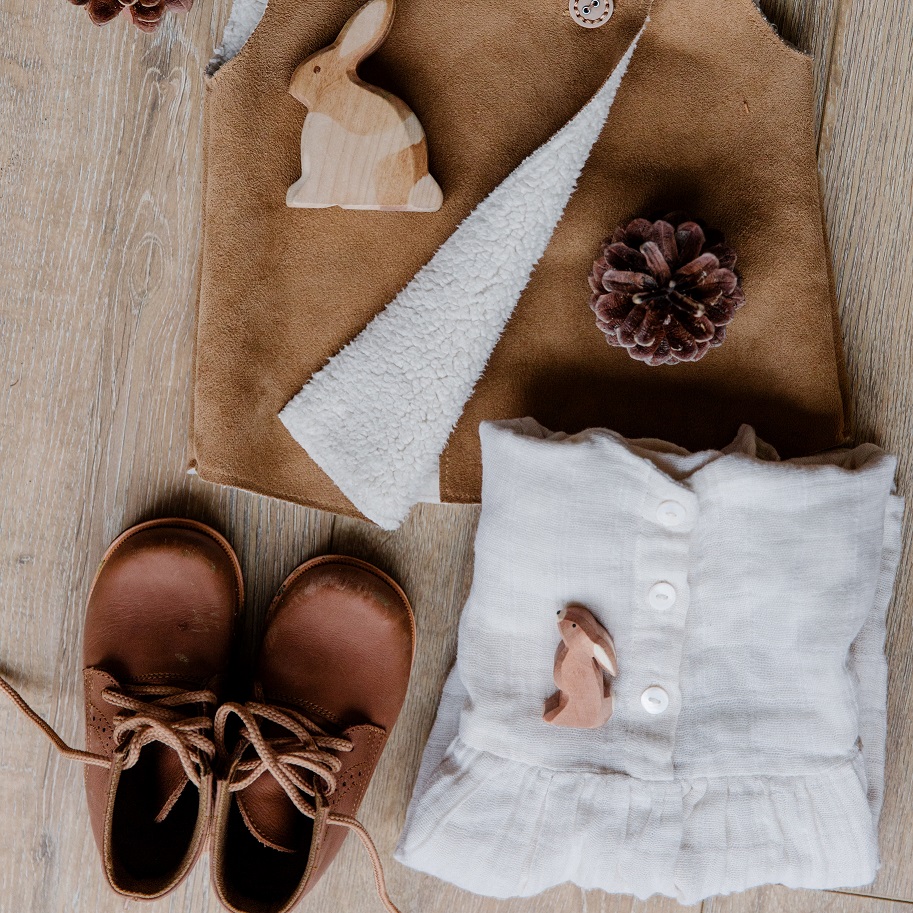 Baby shoes, jacket and shirt, nicely prepared